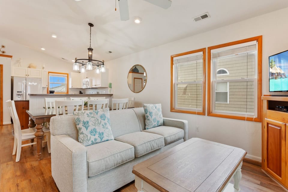 Relax in the spacious Living Area with beautiful lighting and high ceilings.