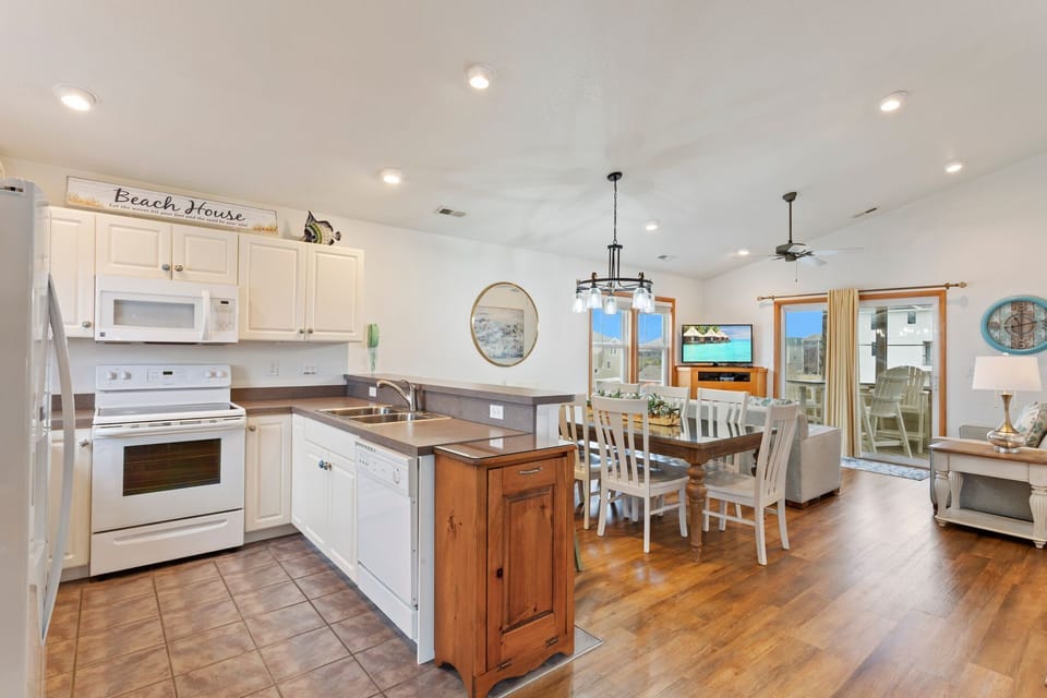 The open-concept floor plan keeps everyone close and together.