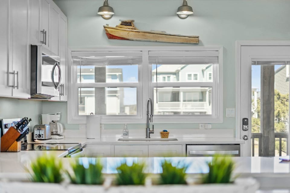 Full kitchen, quarts counterrops, and toaster.