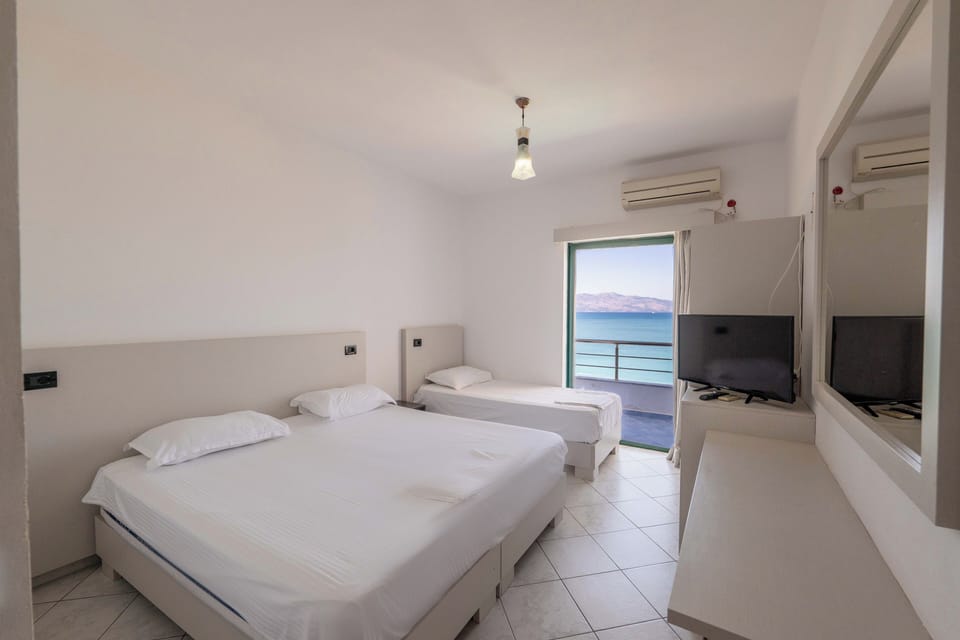 Standard Triple Room | Premium bedding, minibar, blackout drapes, iron/ironing board