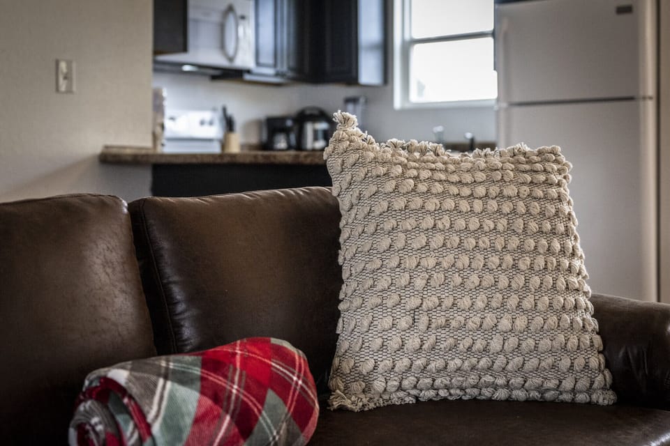 Cozy throw pillows add charm to our living space.