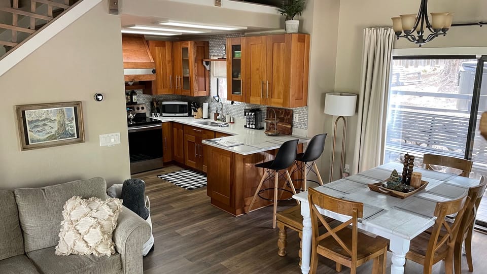 Main house dining area & kitchen. Coffee/tea & various pantry items provided.
