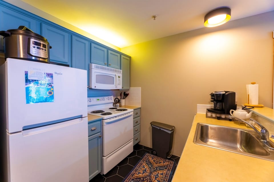 Cook up a feast in this well-equipped kitchen with modern appliances.