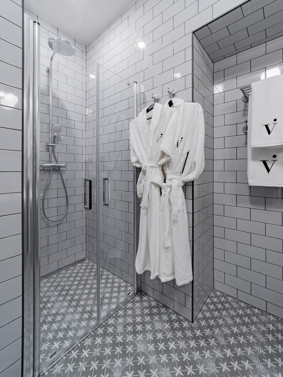 Free toiletries, bathrobes, slippers, heated floors