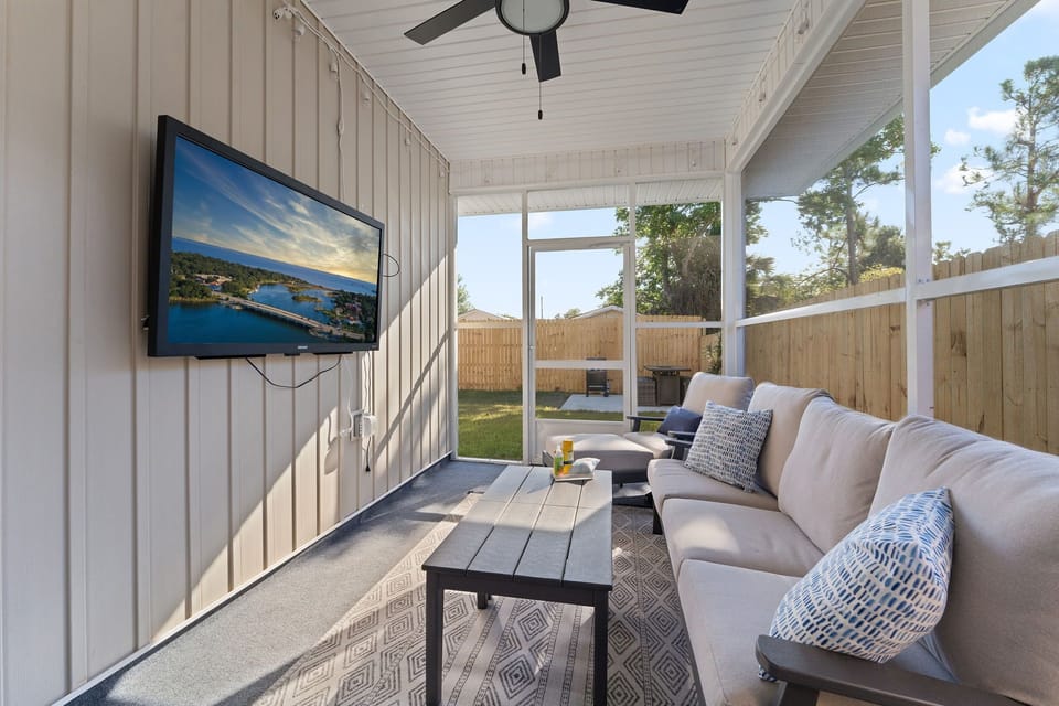 Lounge around on the 3 season porch and enjoy your morning coffee or TV