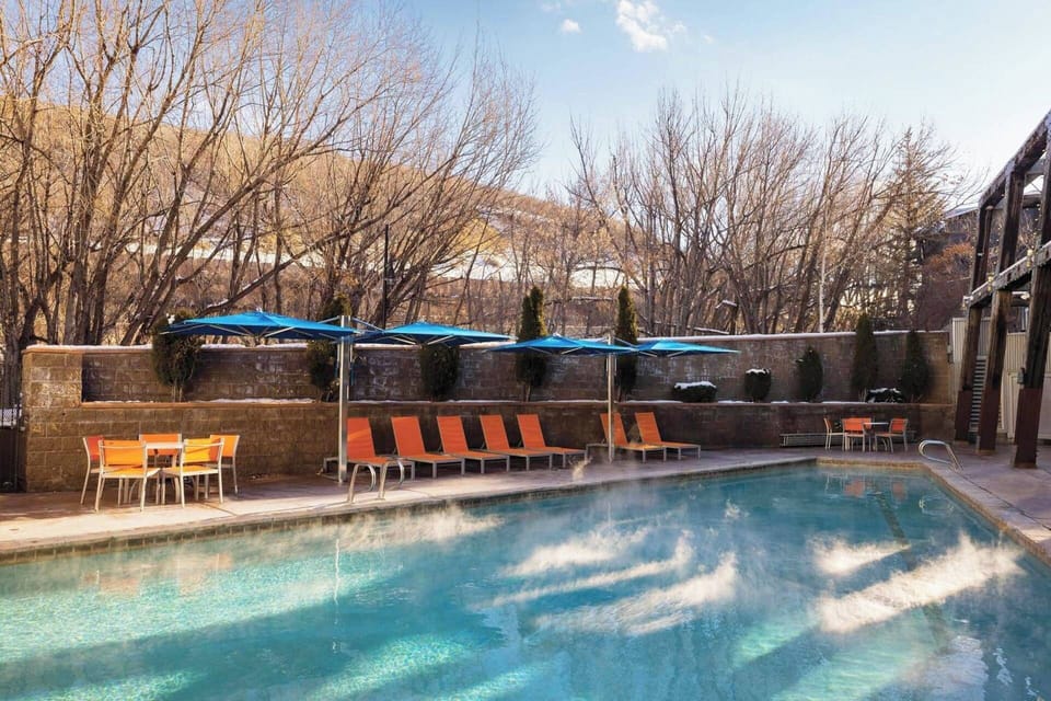 Chairs and umbrellas to enjoy the pool.