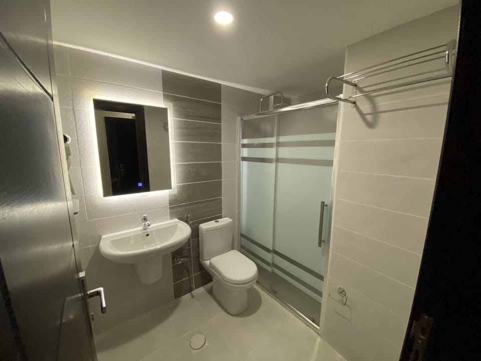 Shower, designer toiletries, hair dryer, bidet