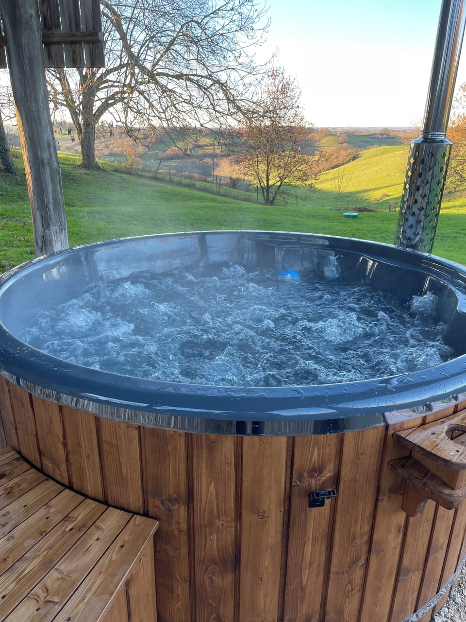 Stunning views as you relax in the wood fired hot tub.