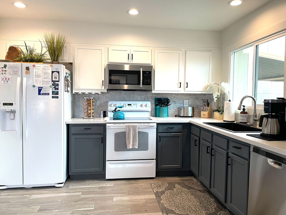 Spacious kitchen stocked with everything you need for an amazing stay.