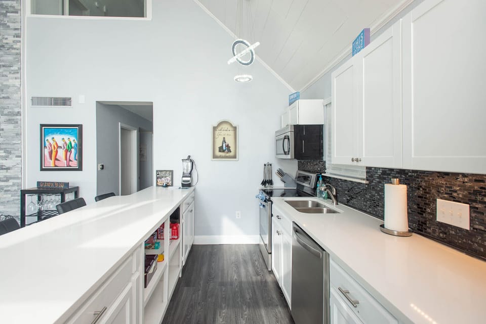 The galley-style kitchen has all the comforts of home and plenty of room to cook