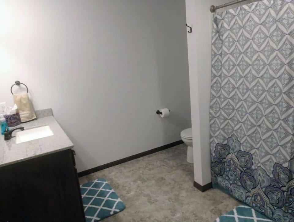 Full bathroom in basement, tub/shower