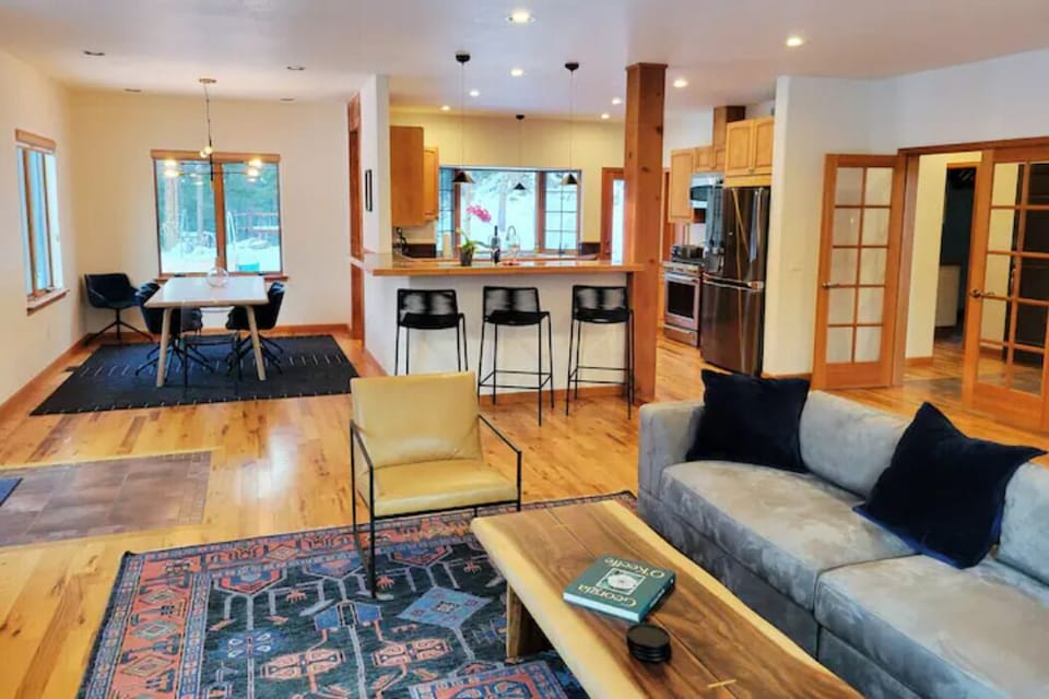 The living room, dining room, and kitchen