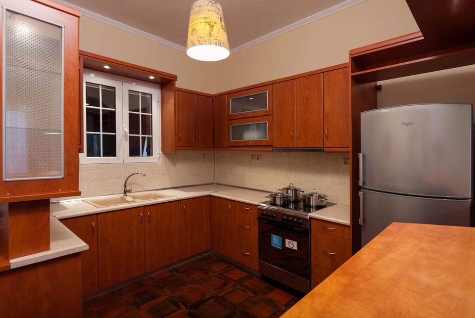 Comfort Apartment | Private kitchen | Full-size fridge, oven, stovetop, coffee/tea maker