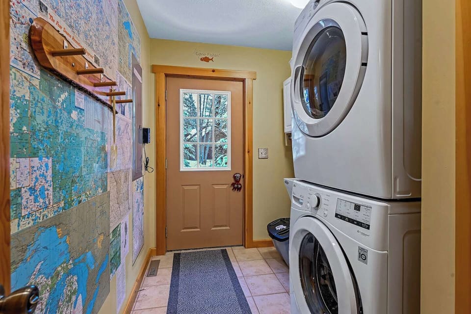 Main-level mud room and full-size stackable washer/dryer combo