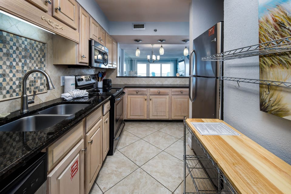 Updated kitchen - FULLY STOCKED! - Everything you need to prepare that memorable meal is right here for you.