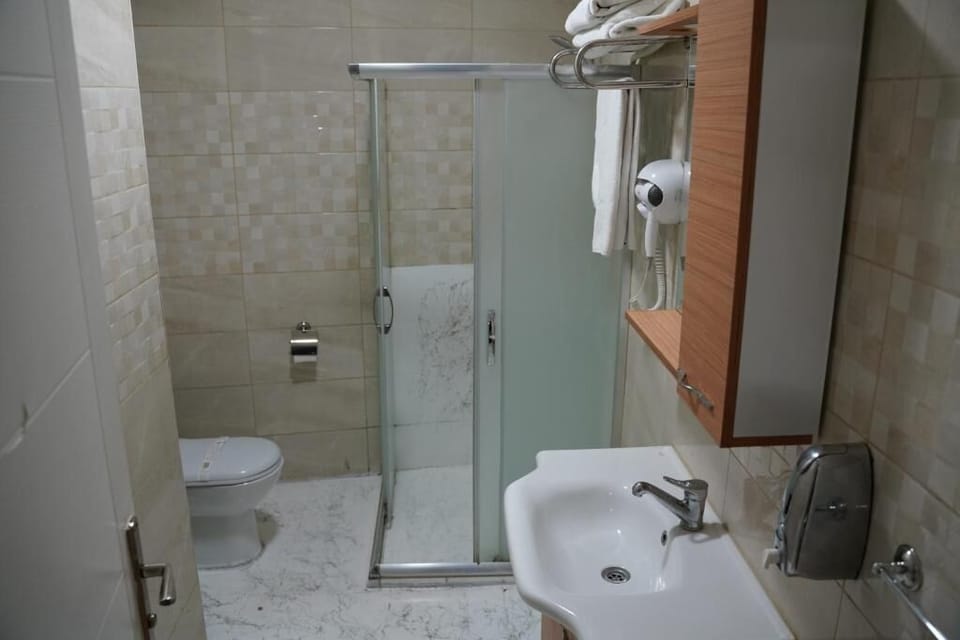 Economy Room, 1 Double Bed | Bathroom | Shower, hydromassage showerhead, hair dryer, heated floors (bathroom)