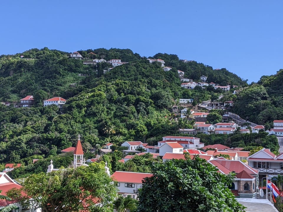 View over Windwardside up to The Level