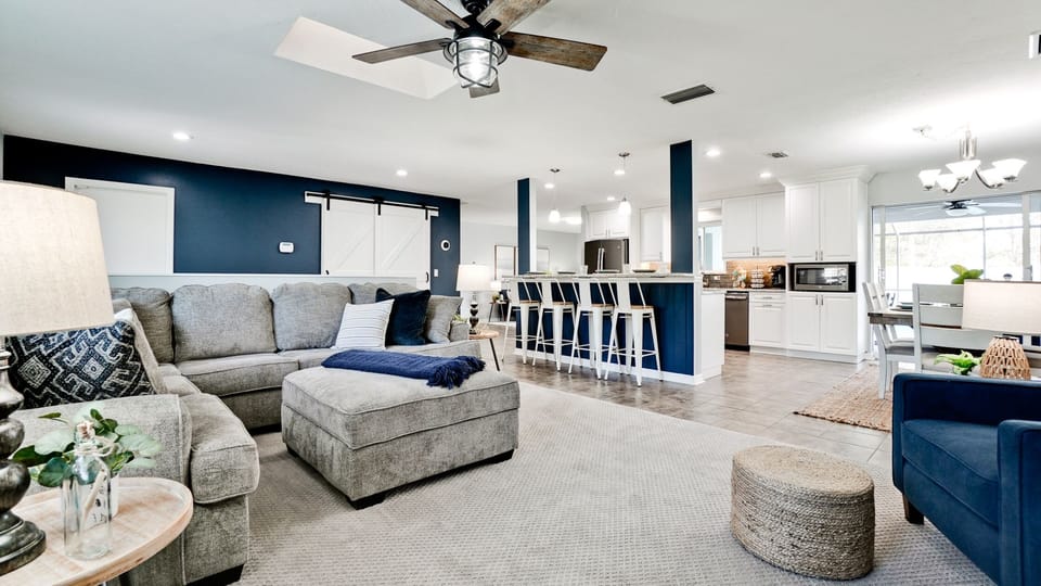 Open-concept living space with easy indoor-outdoor flow and patio access.