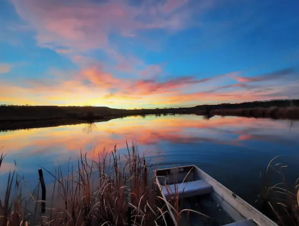 Sunset view down by dock. 