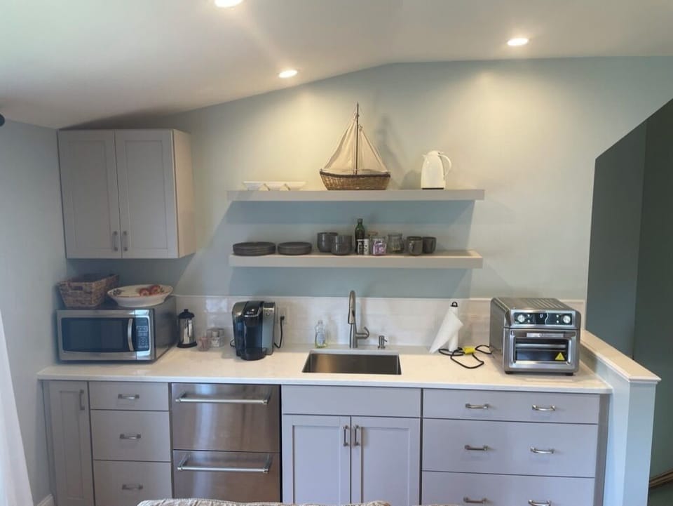Kitchenette sink, microwave, air fryer, conv..oven, refrig & freezer drawers.