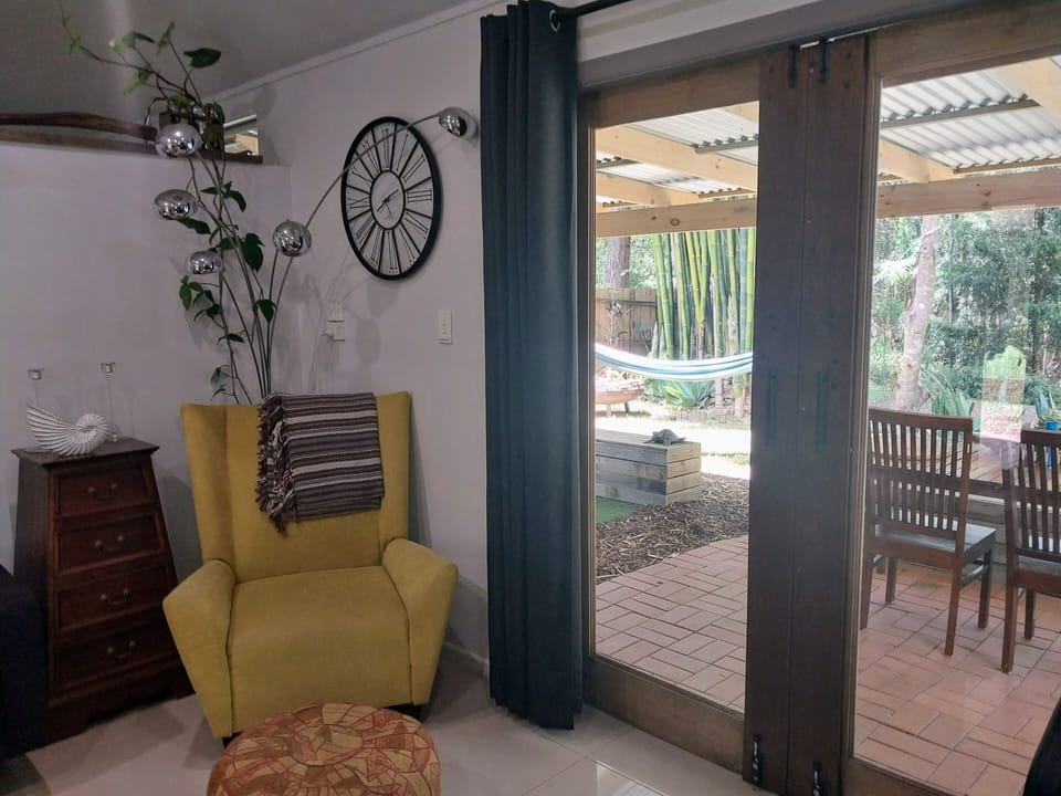 Exit from living area to outdoor undercover veranda facing the creek.