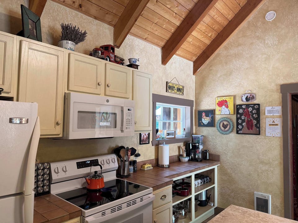 Fully equipped rustic kitchen with modern appliances at the Bunkhouse.