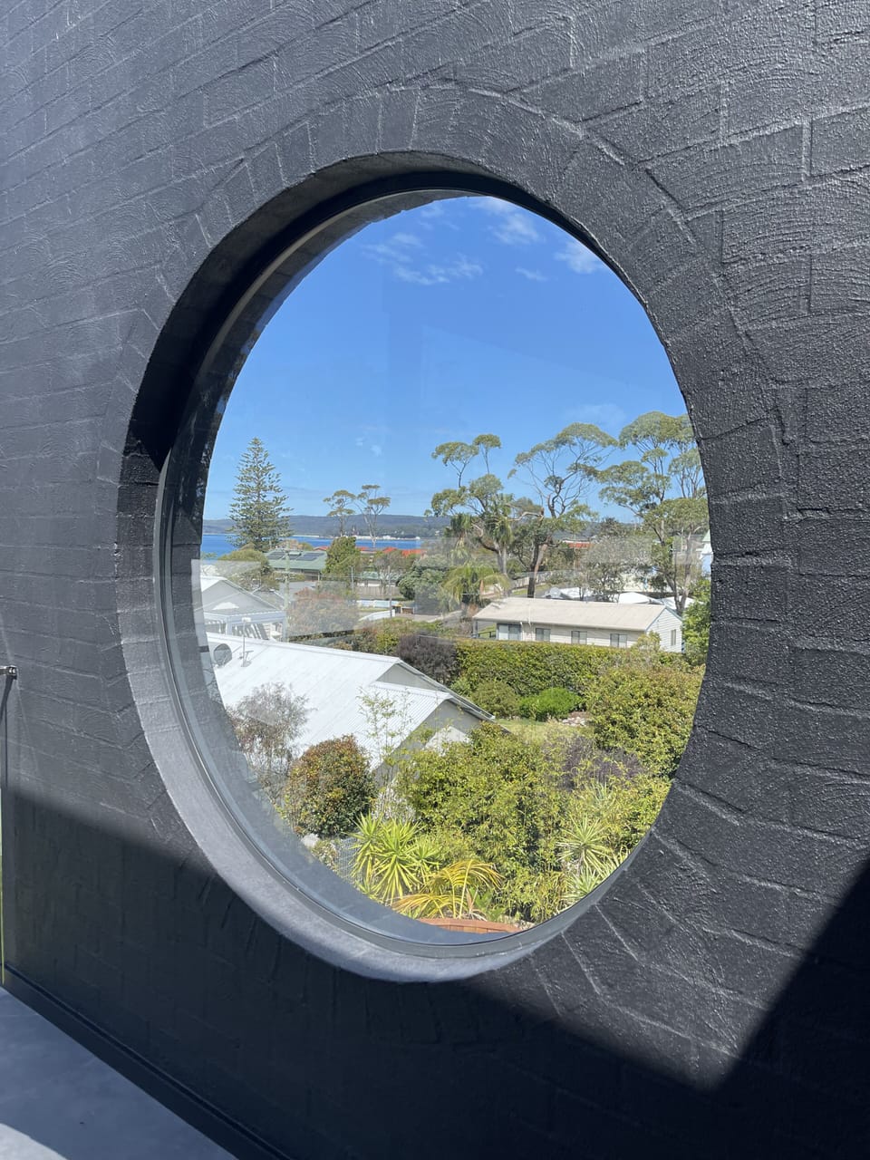 The porthole looking over to the Naval Base from the upstairs balcony

