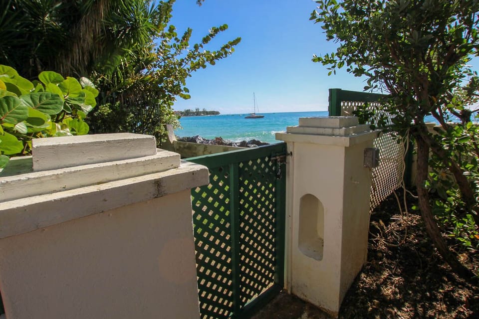 Private beach gate leading out to the boardwalk and beach