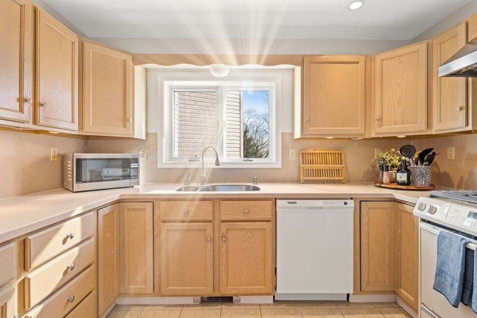 [Kitchen] Bright and inviting kitchen with plenty of space to cook and gather.