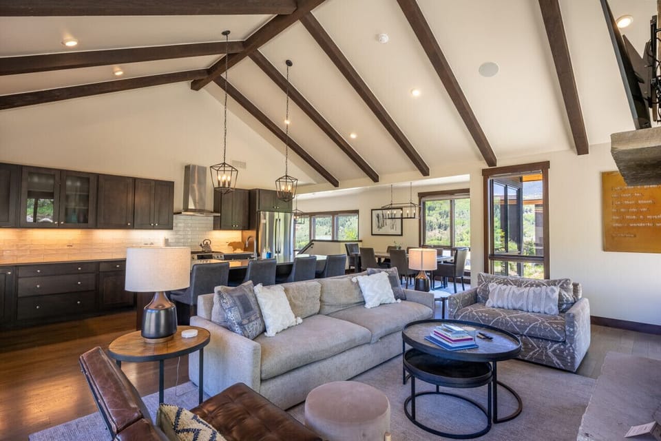 Bright and open living area with a fireplace to cozy up by