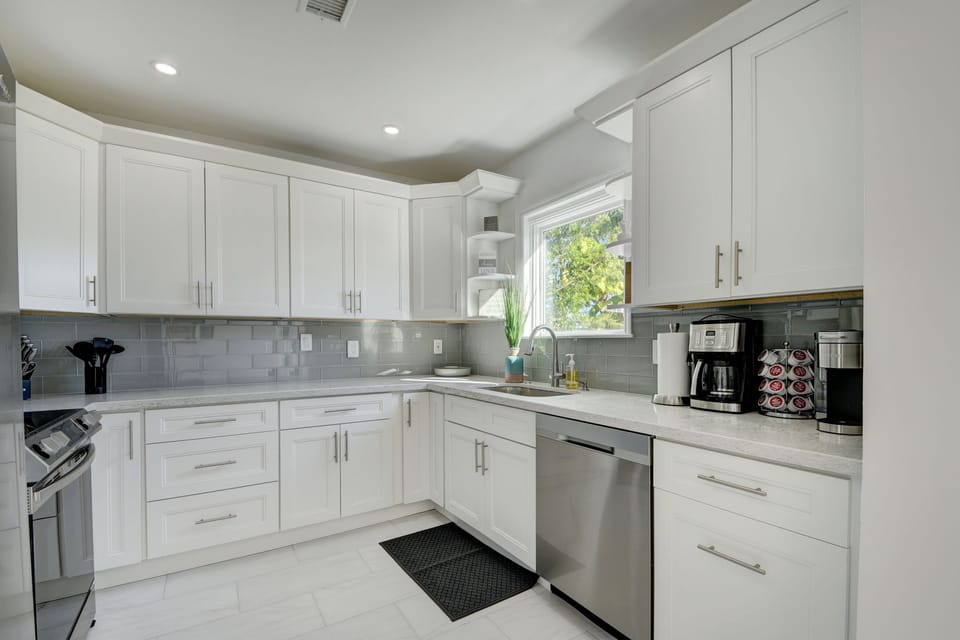 Gorgeous kitchen looking out to pool and golf course!