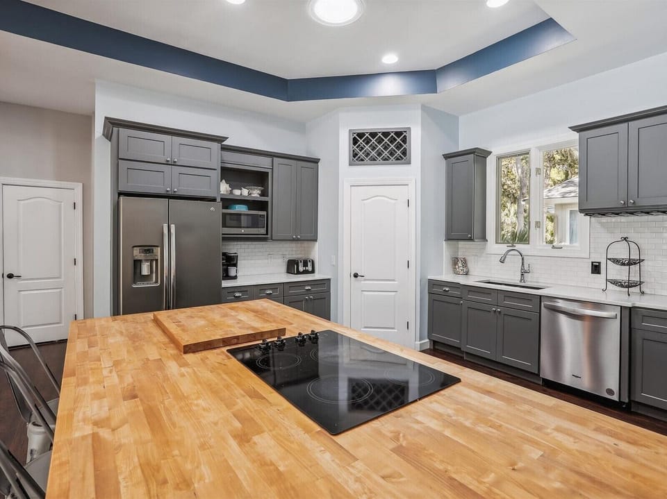 Kitchen with Stainless Steel Appliances at 6 Cottage Court