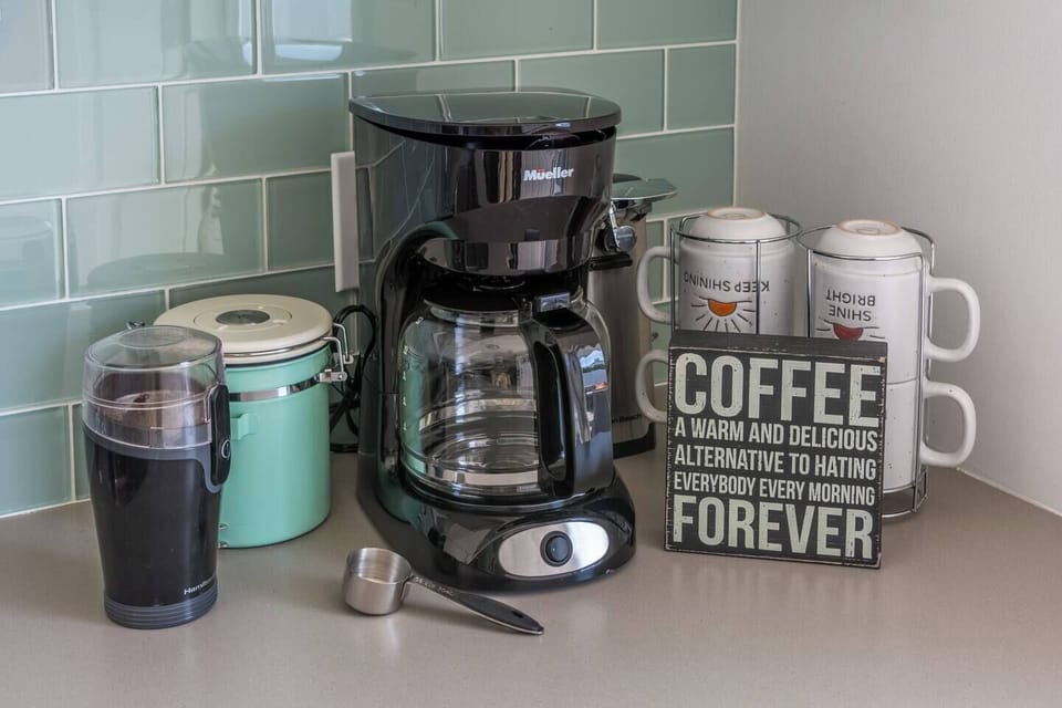 Your the first cup before anyone else is up. The COFFEE FOREVER station is loaded, grinder ready, beach within walking distance from here.