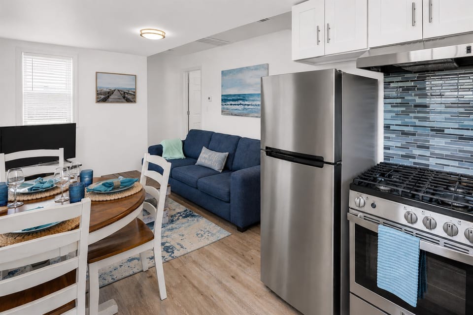 Drop the bags, grab a seat, and pour the first glass of wine. This open kitchen/living/dining room is where you and yours lands the second you walk in.