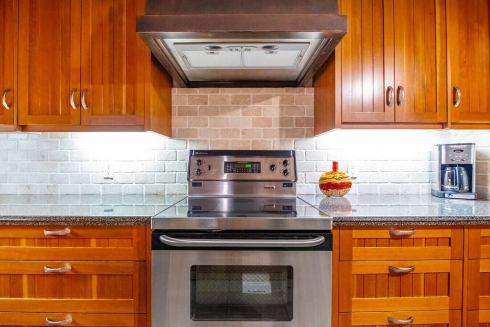 A full chef`s kitchen with access to the private balcony/deck.