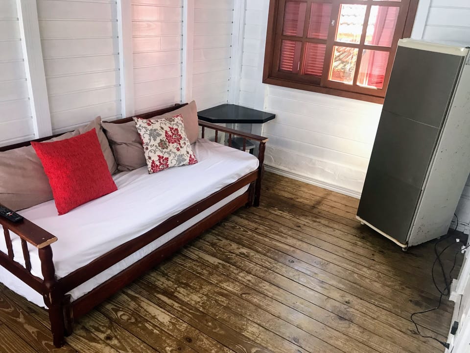 Luxury Suite | Living room | 32-inch Smart TV with digital channels