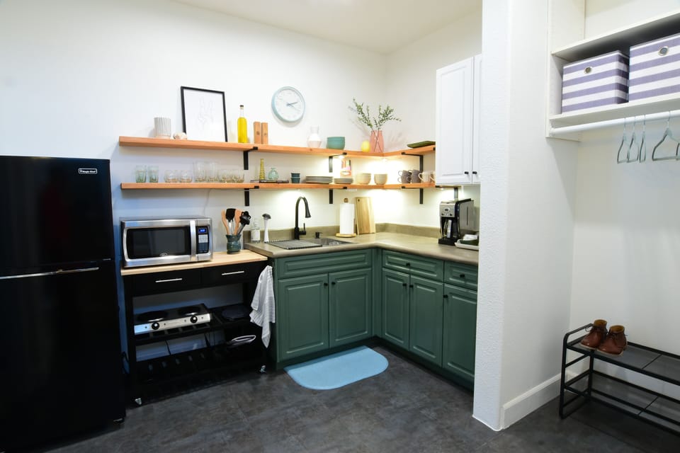 Kitchen stocked with everything you need for your stay. Coffee and tea included.