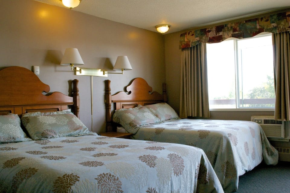 Standard Room, 2 Queen Beds | WiFi (free), bed sheets