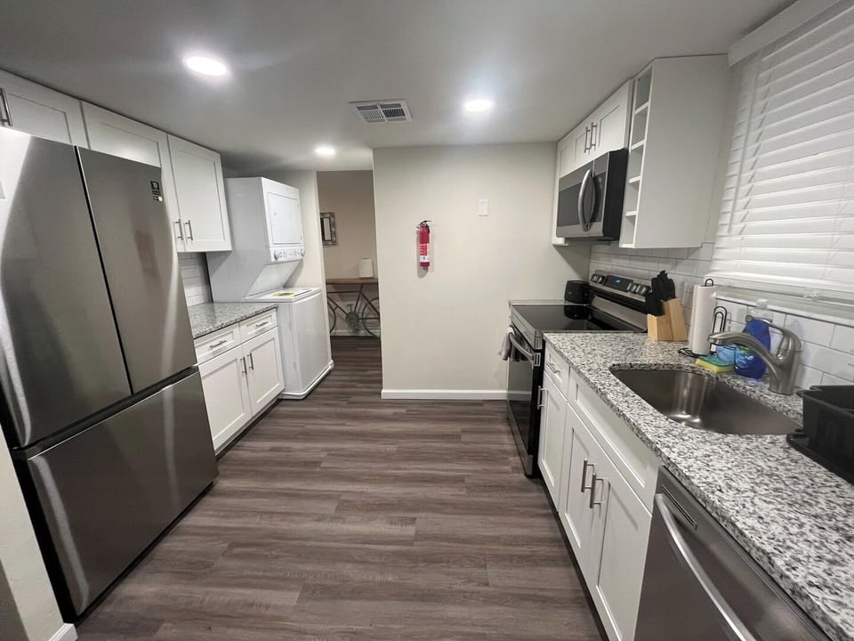 Full Kitchen featuring New Appliances and Washer & Dryer to Use at Your Convenience