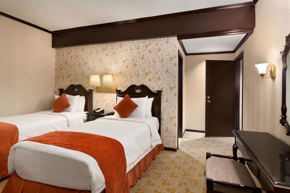 Suite, 3 Bedrooms | Minibar, in-room safe, soundproofing, iron/ironing board