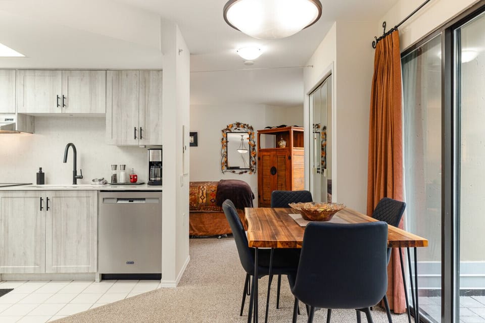 The dining table is setup for up to four people.