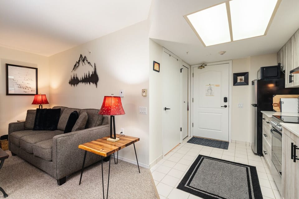 The entry way leads into the kitchen and main area.