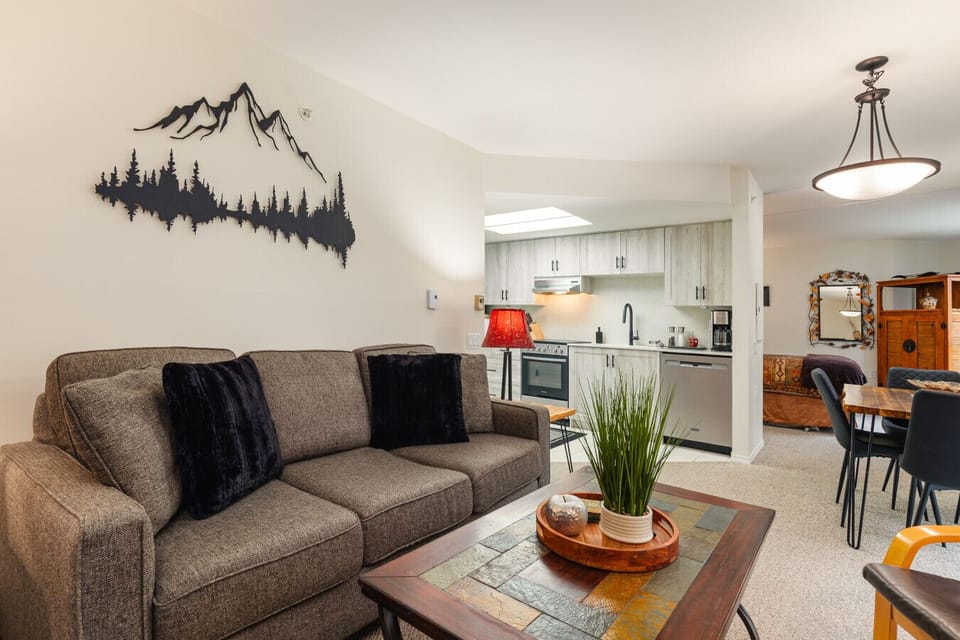 Inside the Maple, you will find an inviting living room, a dining area, and ground-level access to your patio.