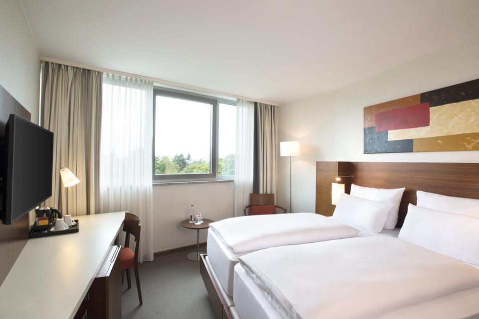 Premium bedding, pillowtop beds, minibar, in-room safe