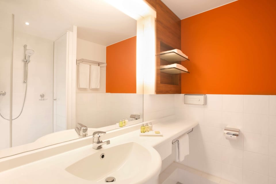 Shower, rainfall showerhead, eco-friendly toiletries, hair dryer