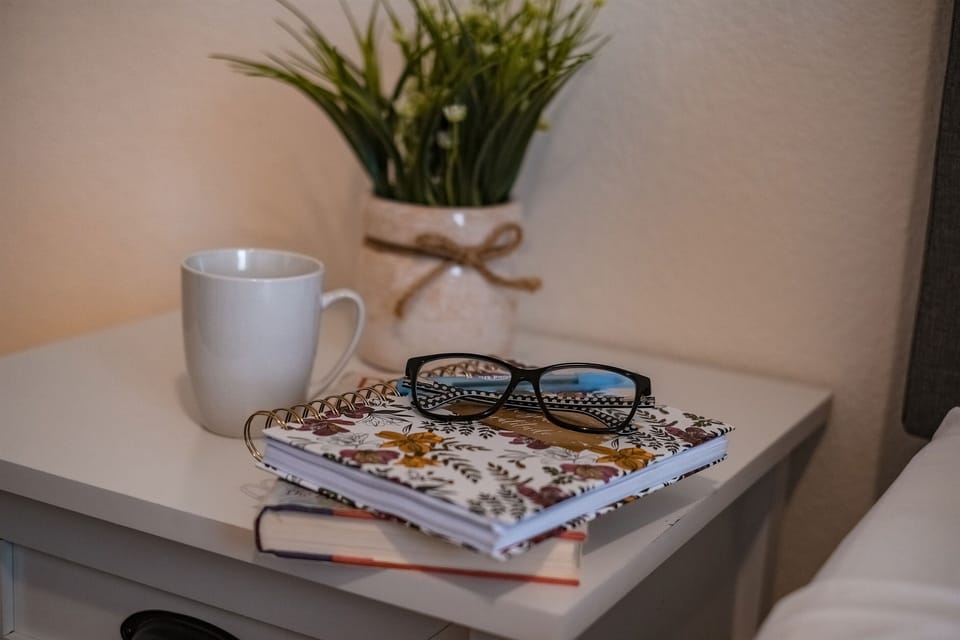 A good book and a cozy bed — the perfect end to any day.