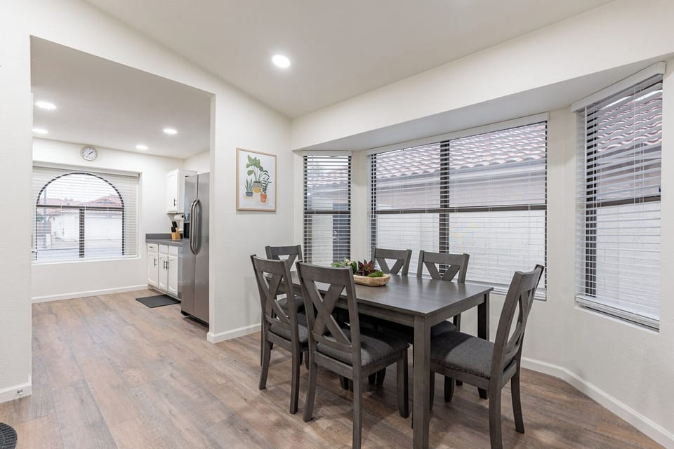 Dining room open to kitchen with seating for 6.