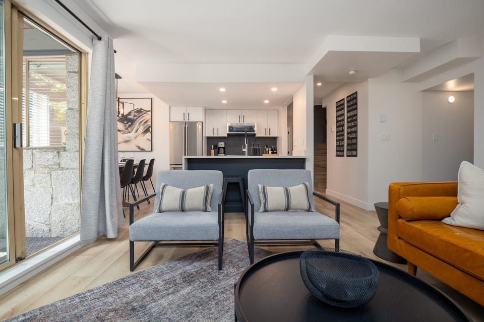 Livingroom/Kitchen - Open concept sight lines through the entire main living space