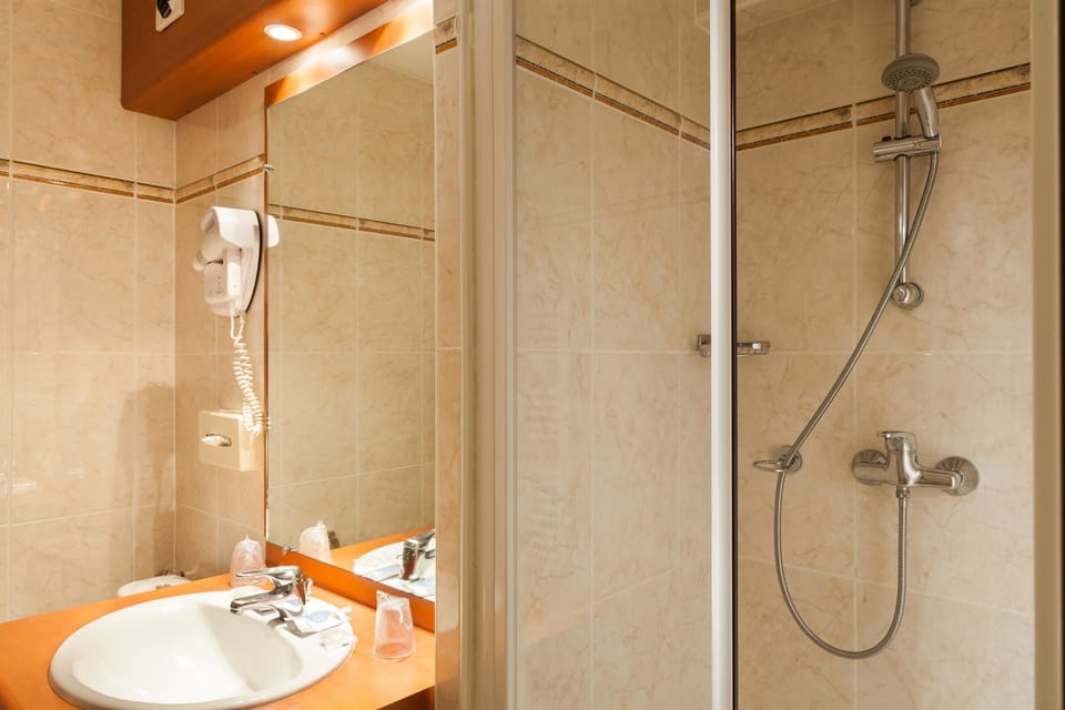 Eco-friendly toiletries, hair dryer, towels