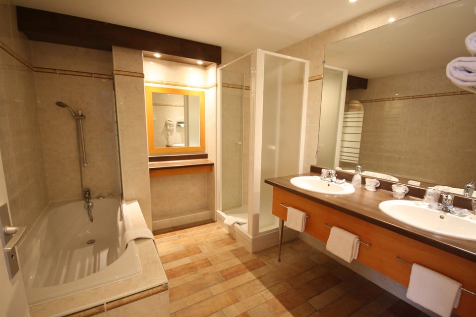 Eco-friendly toiletries, hair dryer, towels